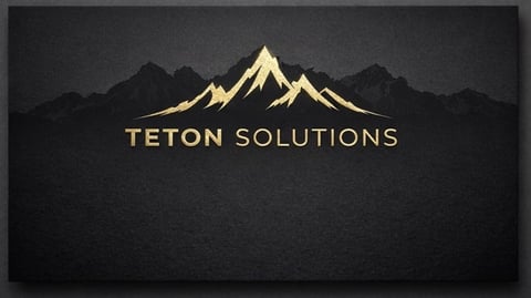 Teton Solutions logo featuring a gold mountain peak silhouette on dark textured background